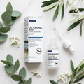 EELHOE Lactobionic Acid Pore Refining Serum flatlay on marble with leaves and flowers